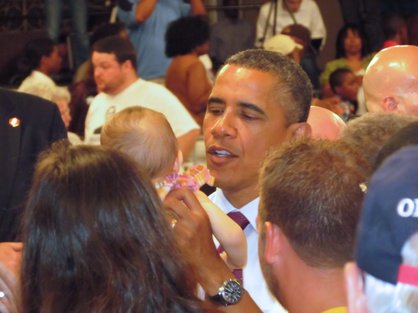 Barrack Obama holding a baby