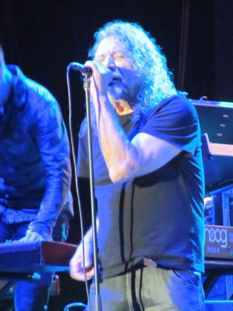 Robert Plant holding a mic