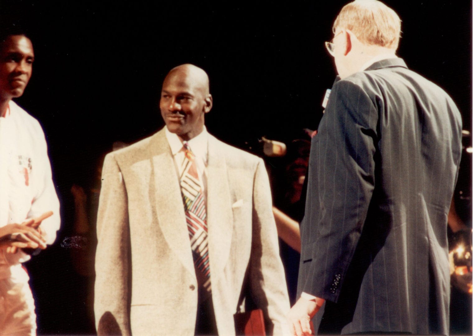 MJ wearing a bright coat